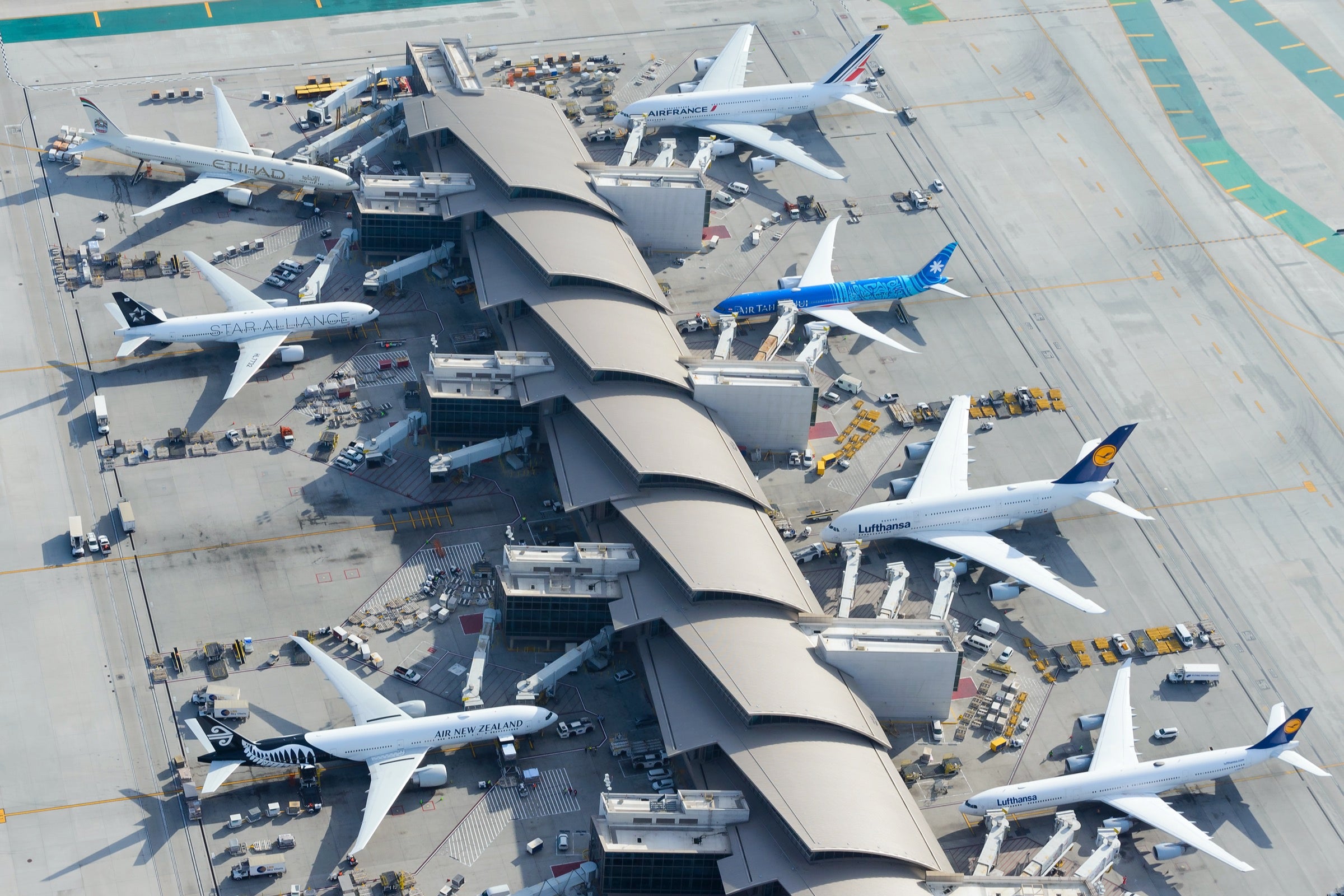 Aerial view of LAX airport with assorted planes