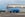 一架涂上微风航空公司涂装的空客A220飞机停在阿拉巴马州莫比尔空中客车工厂的涂装车间前