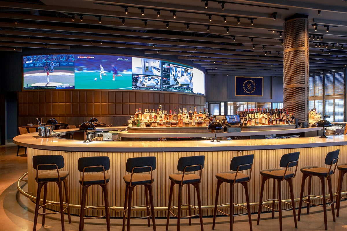 A rooftop pool deck and harbor views lure visitors to Boston’s just