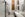 large white marble bathroom with shower, large white bathtub, and large vanity sink and mirror