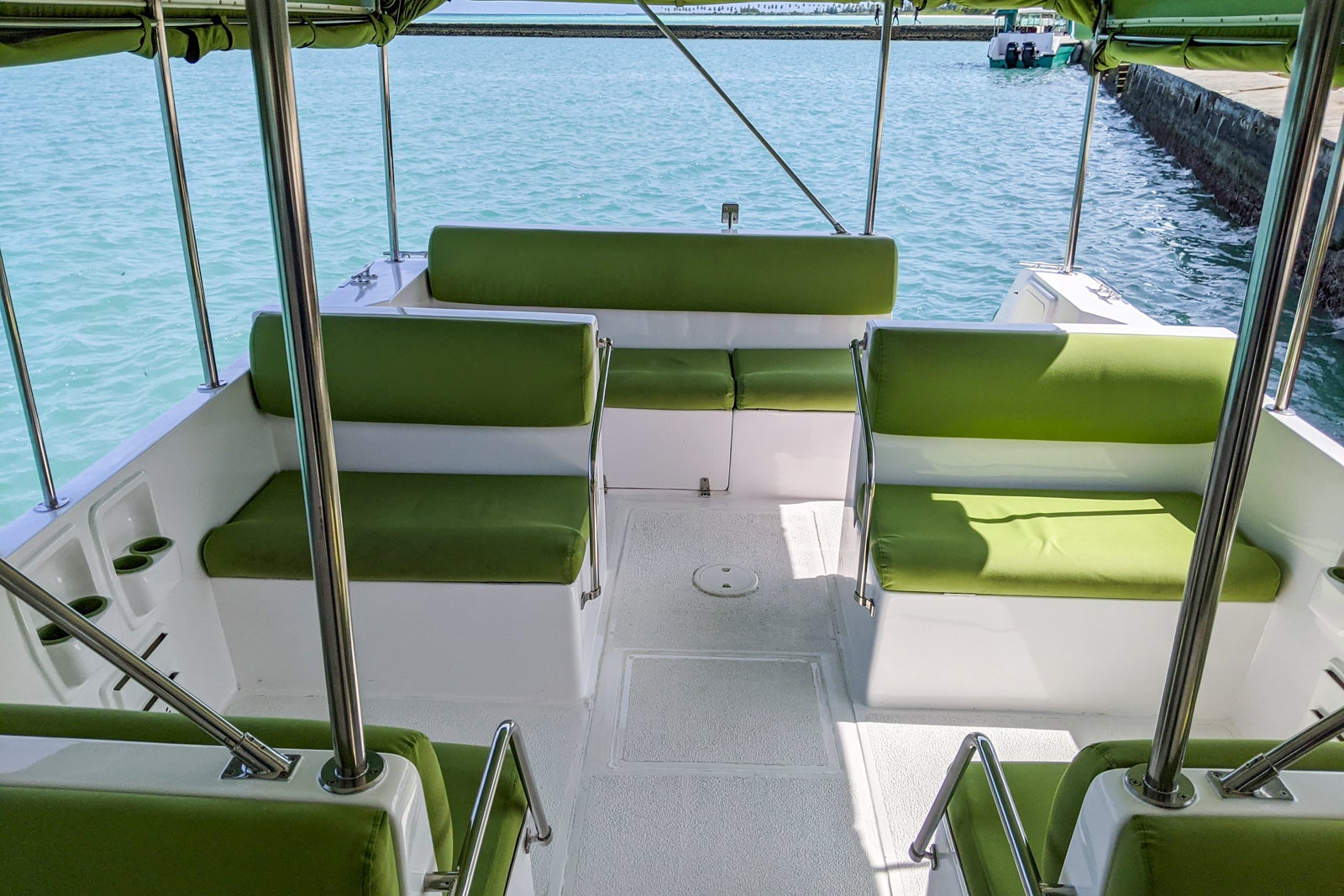 Seating on boat to Six Senses
