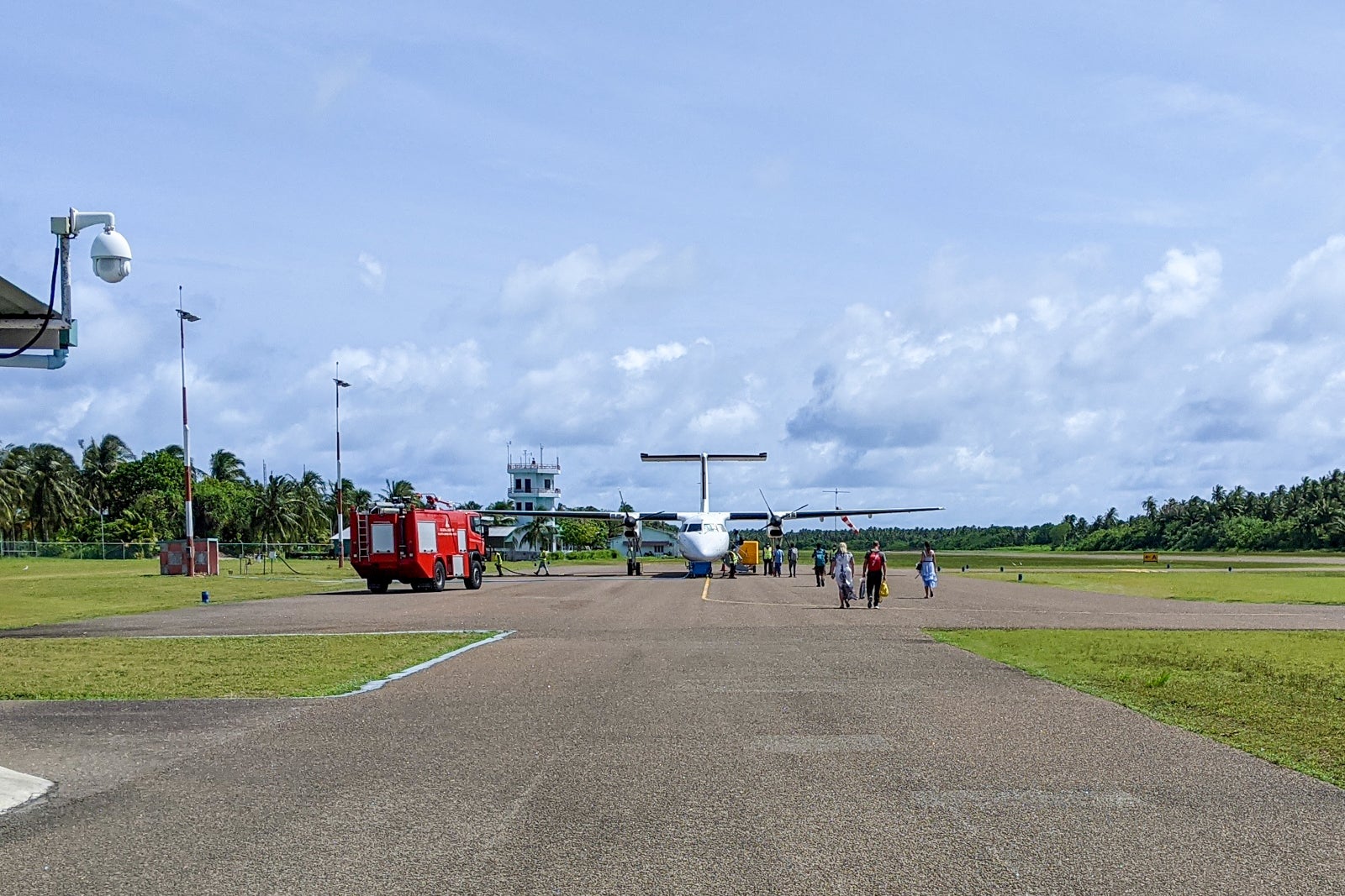 Walking to our plane at Kadhdhoo airport