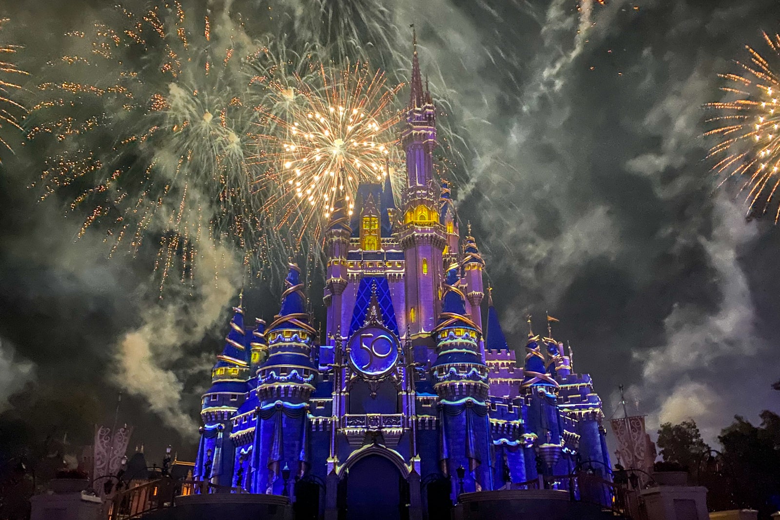 Fireworks light the sky behind Cinderella's Castle at Disney World's Magic Kingdom