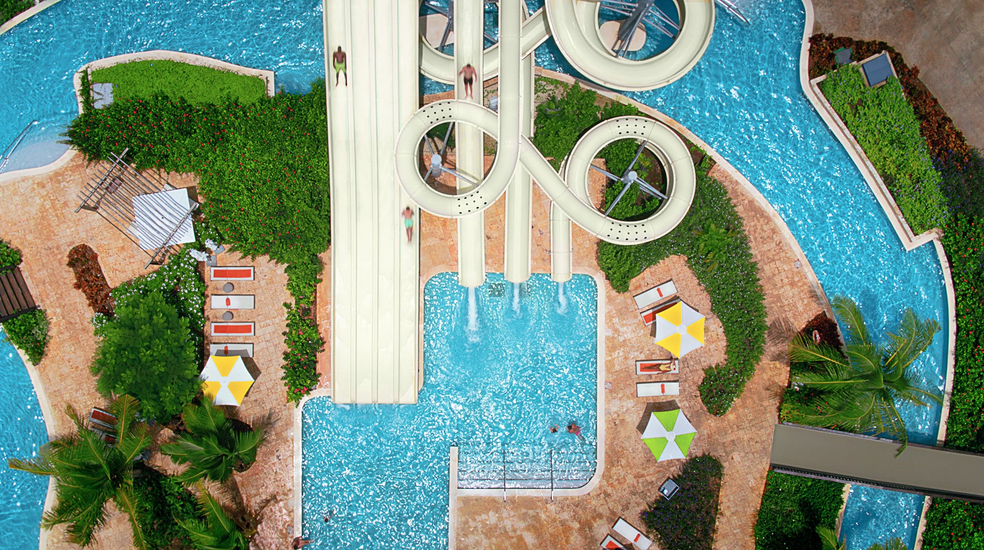 Lazy river and waterslide at a Dreams Resort & Spa