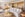 large suite with wooden accents, beige couch, wooden lips on wall