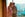 teenage boy and girl standing in window overlooking Las Vegas strip