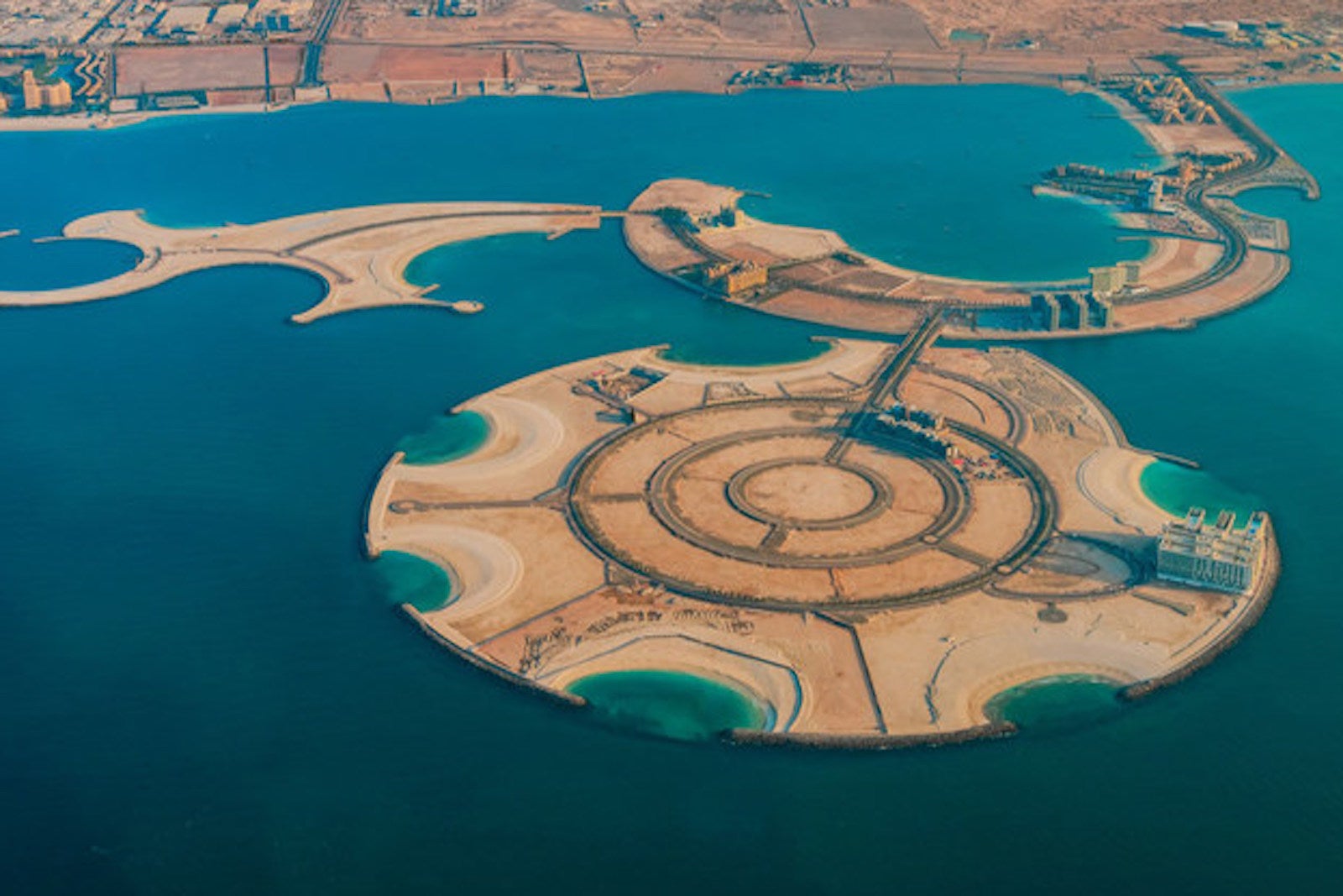 aerial photo of man-made island off coast of UAE