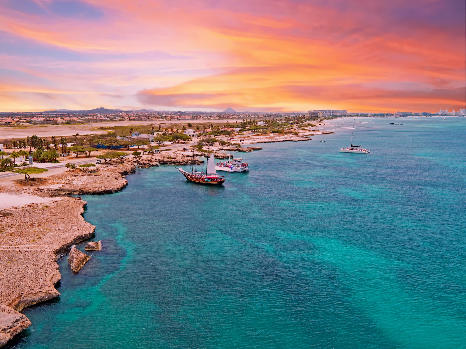 Round-trip flights to Aruba for as low as $290