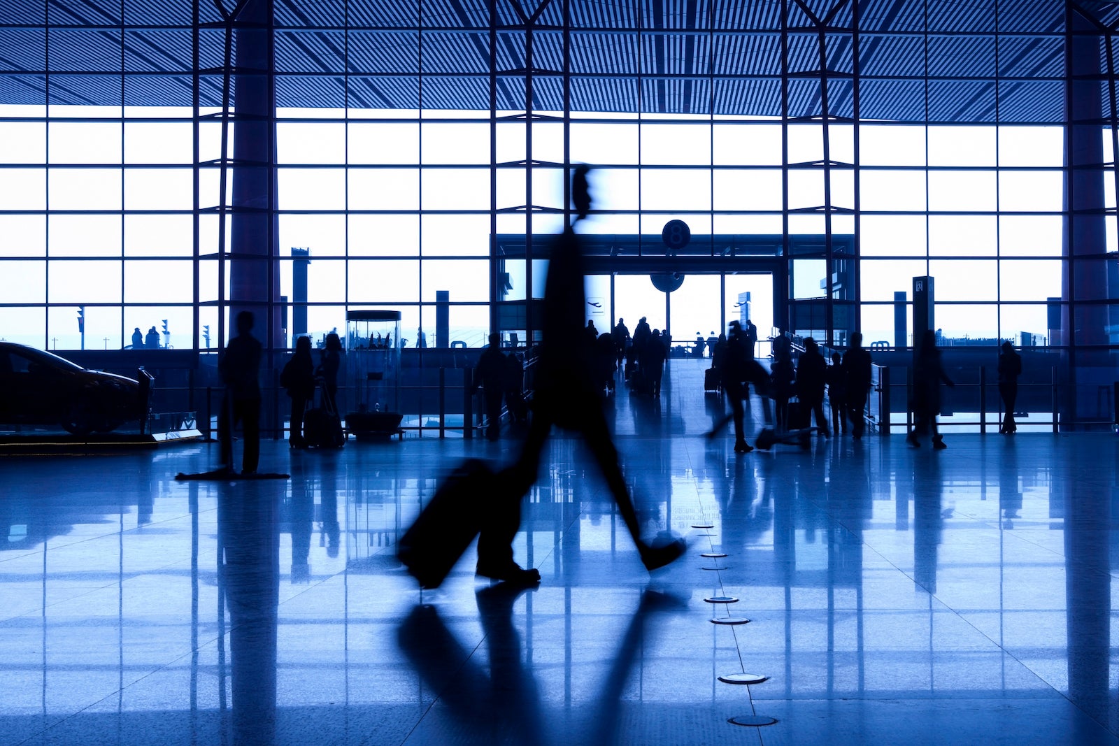 People silhouettes at airport building