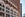 exterior of brick building with sign reading "Proper"