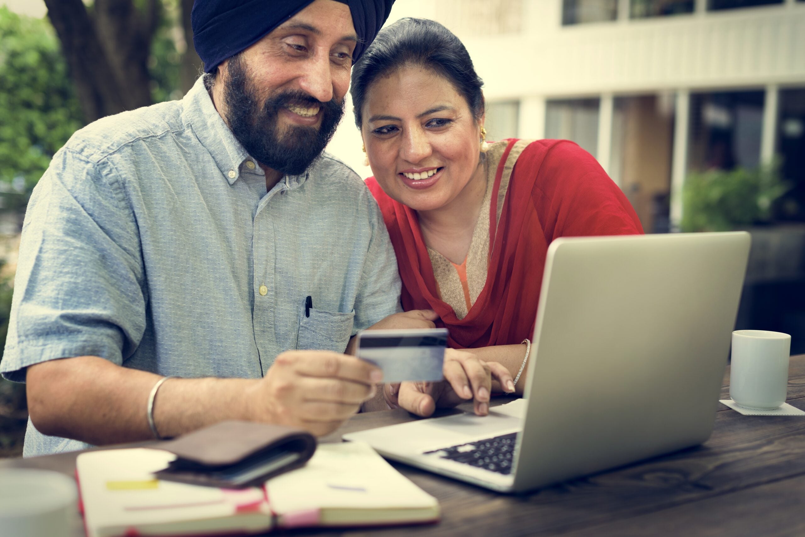 Indian,Couple,Using,Device,Concept