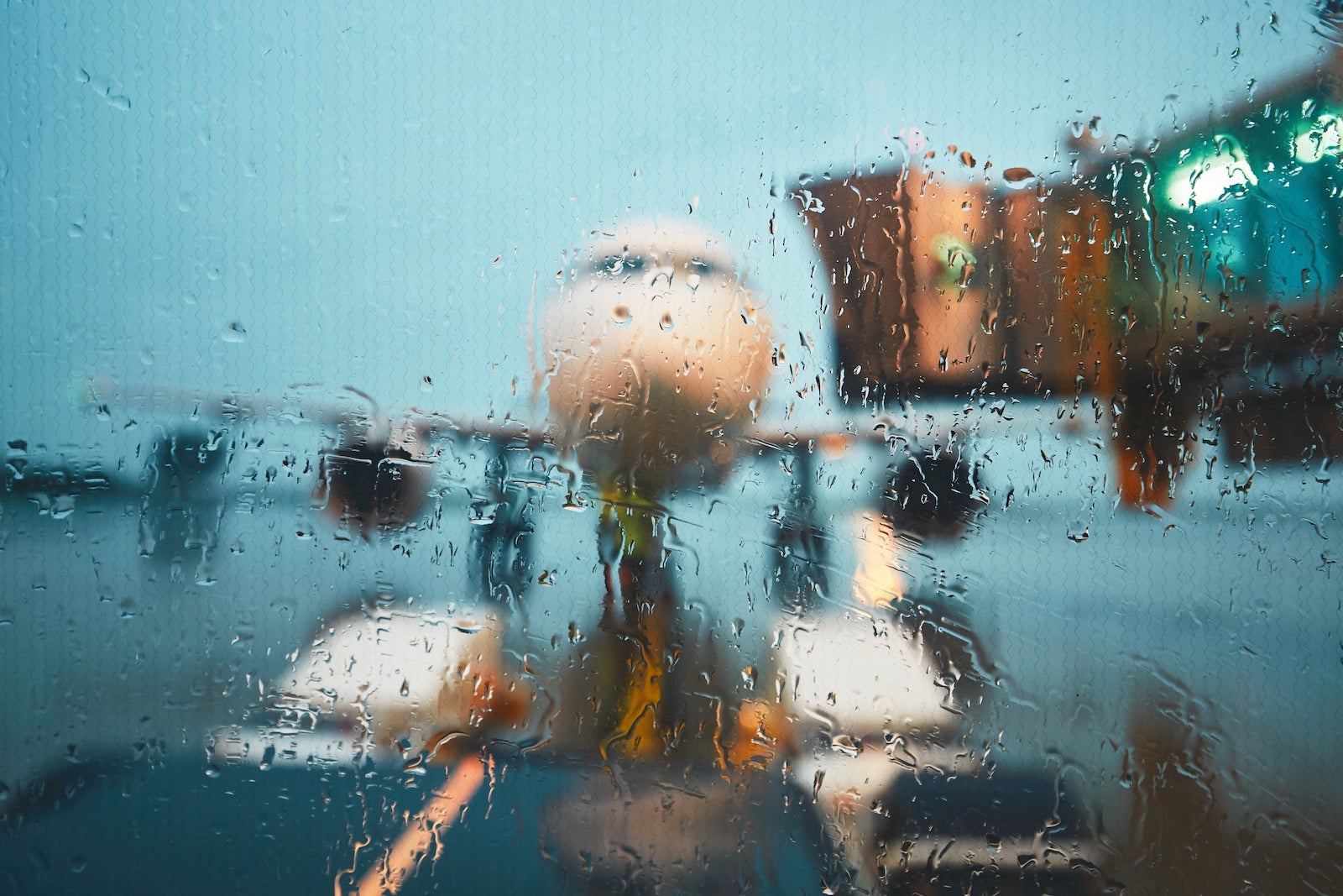 A,Busy,Airport,In,The,Rain.,Push,Back,Of,The