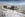 rendering of modern ski resort with people skiing