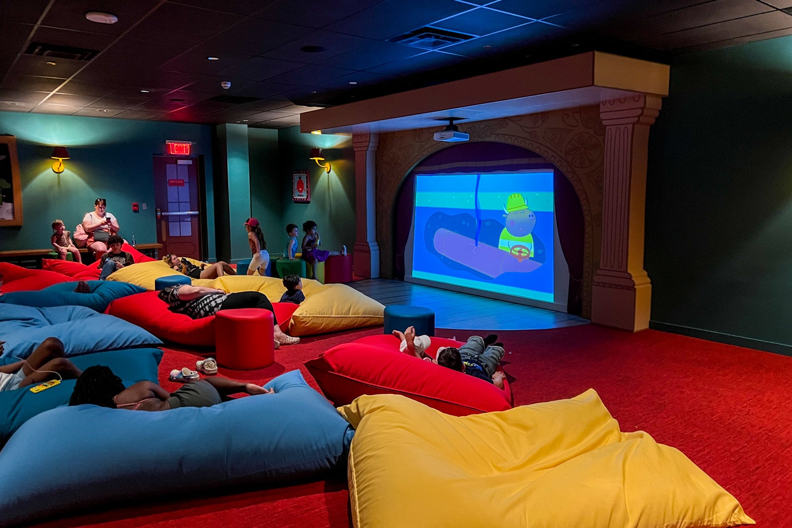 Indoor cinema with large floor cushions at Peppa Pig Theme Park