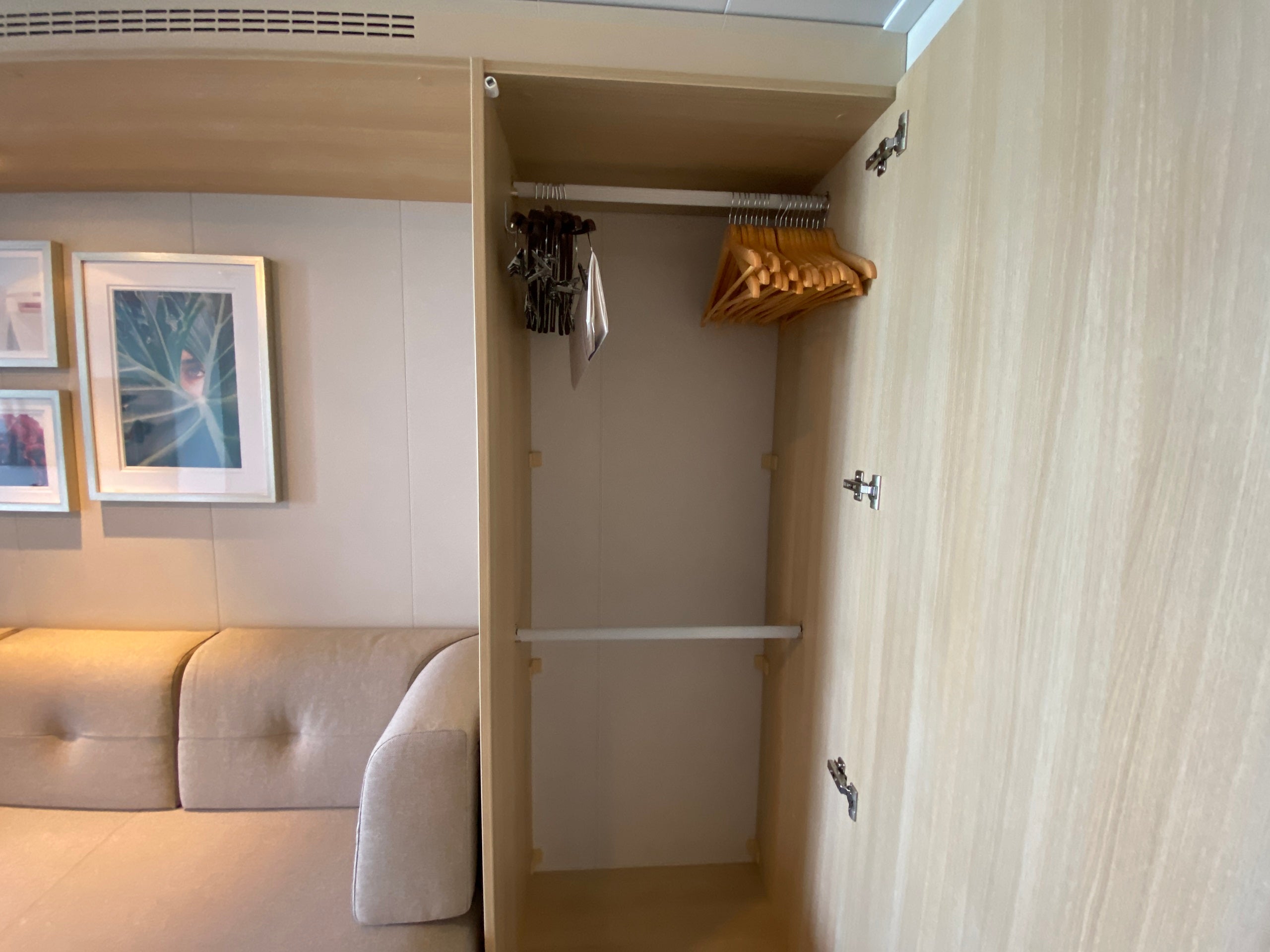 The second closet with a removable bar in a balcony cabin on Royal Caribbean's Wonder of the Seas.
