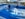 A passenger surfs on the FlowRider on Royal Caribbean's Wonder of the Seas