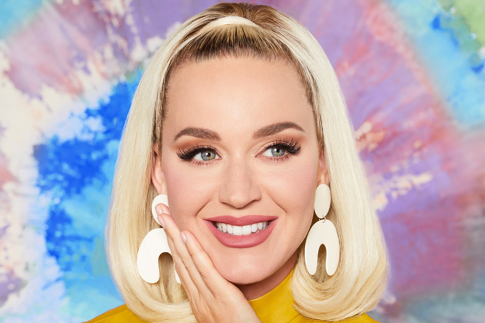 Photo of Katy Perry wearing large white earrings