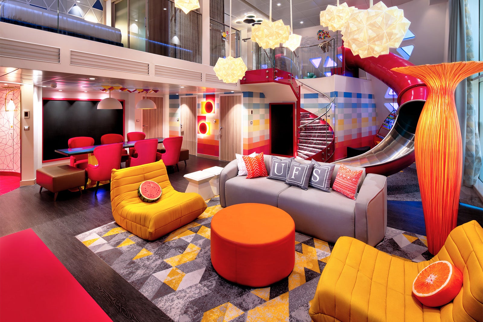 Colorful living room with couch, table and slide