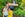Child and mom standing outside roller coaster entrance