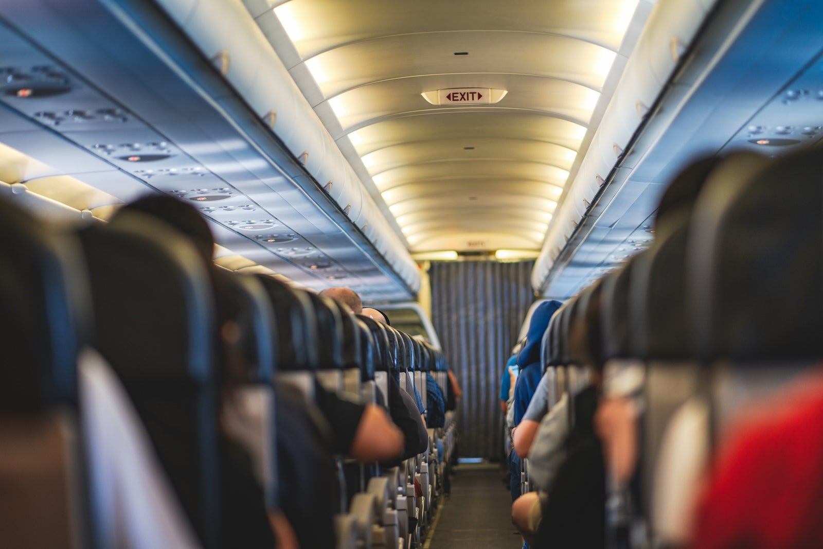 Tips for combating aches and pains on long flights - The Points Guy