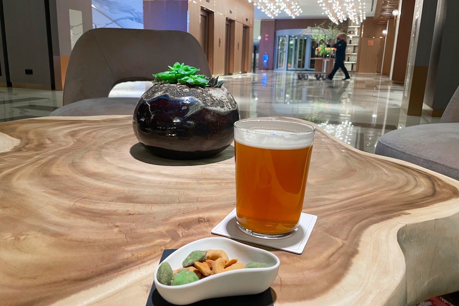 beer and nuts on table