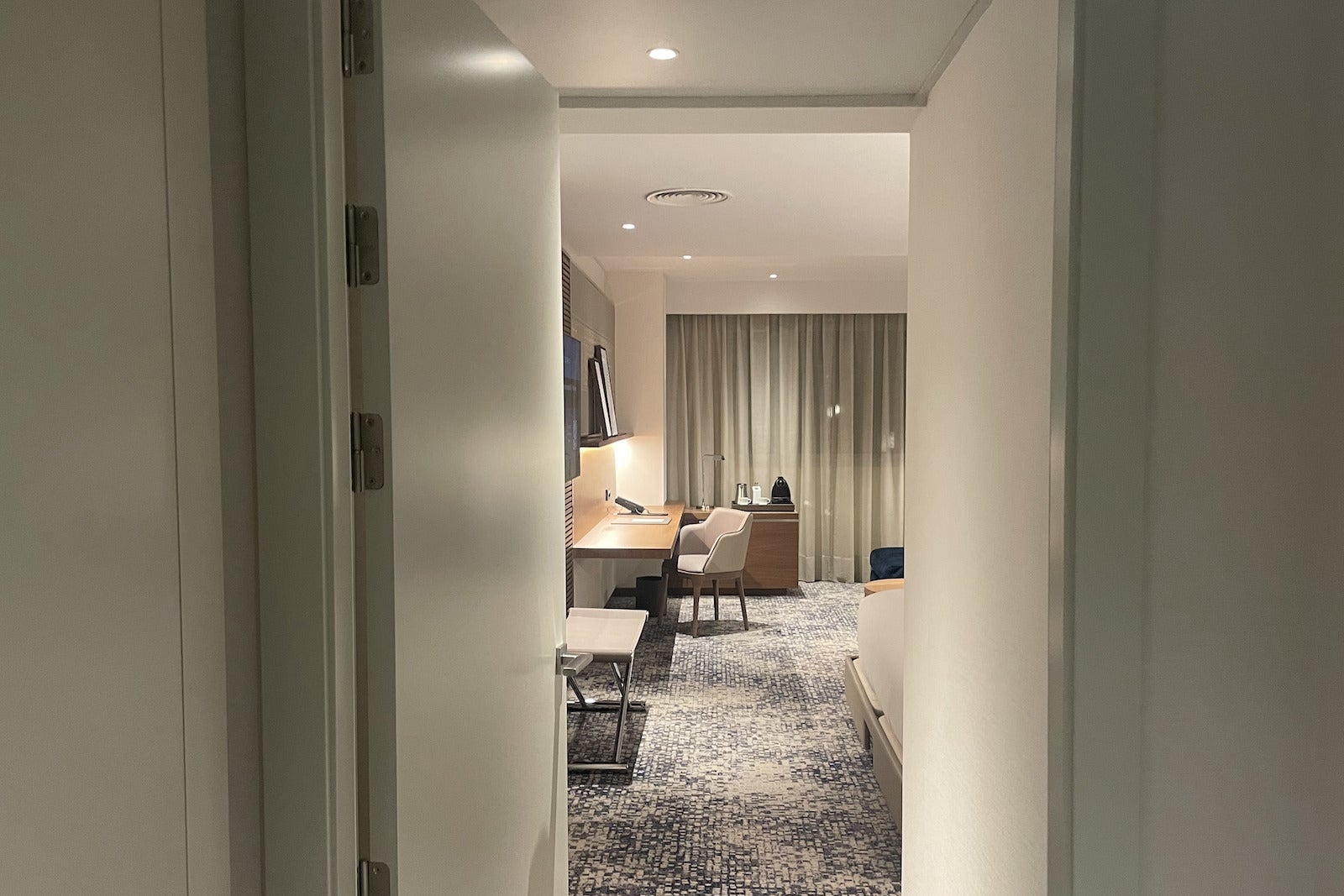 hallway looking into hotel room
