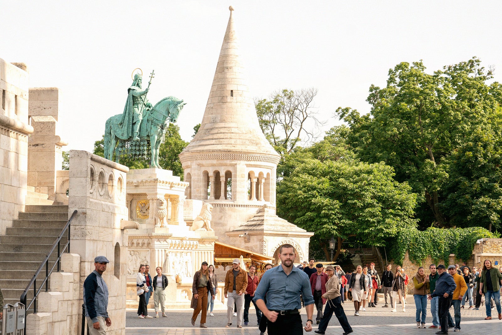 Special Agent Scott Forester runs toward the camera with Fisherman's Bastion in Budapest in the background