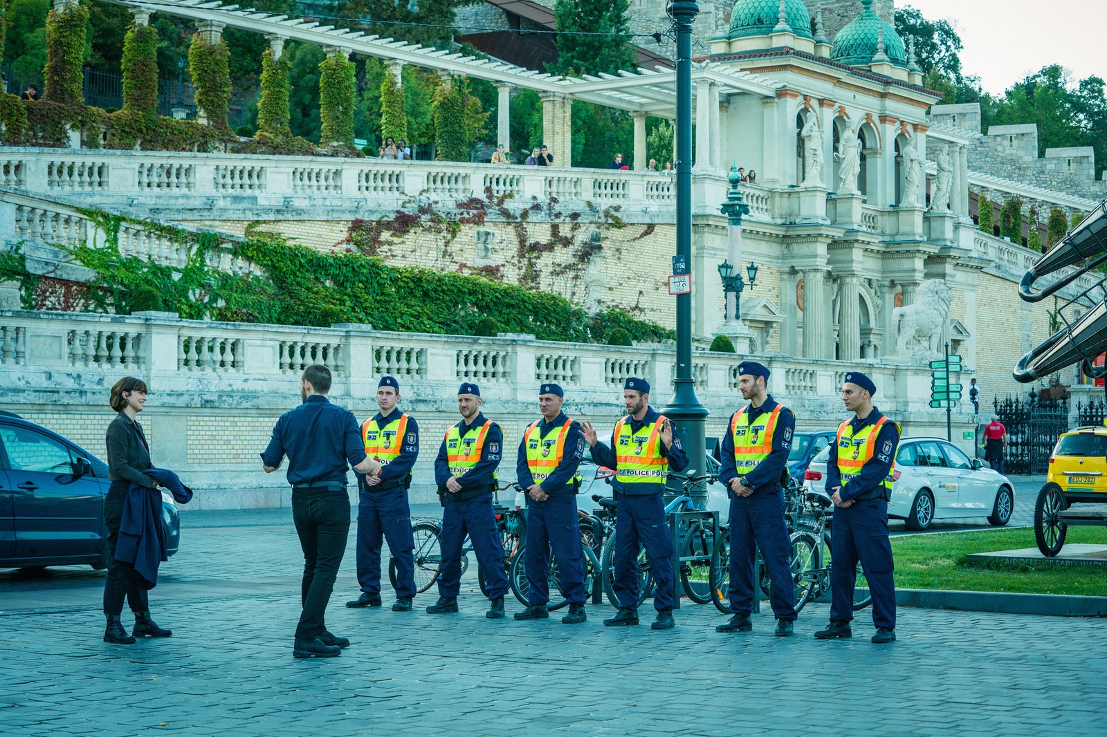 Special Agent Scott Forester teaches local law enforcement in front of Castle Garden Bazaar in Budapest during an episode of 