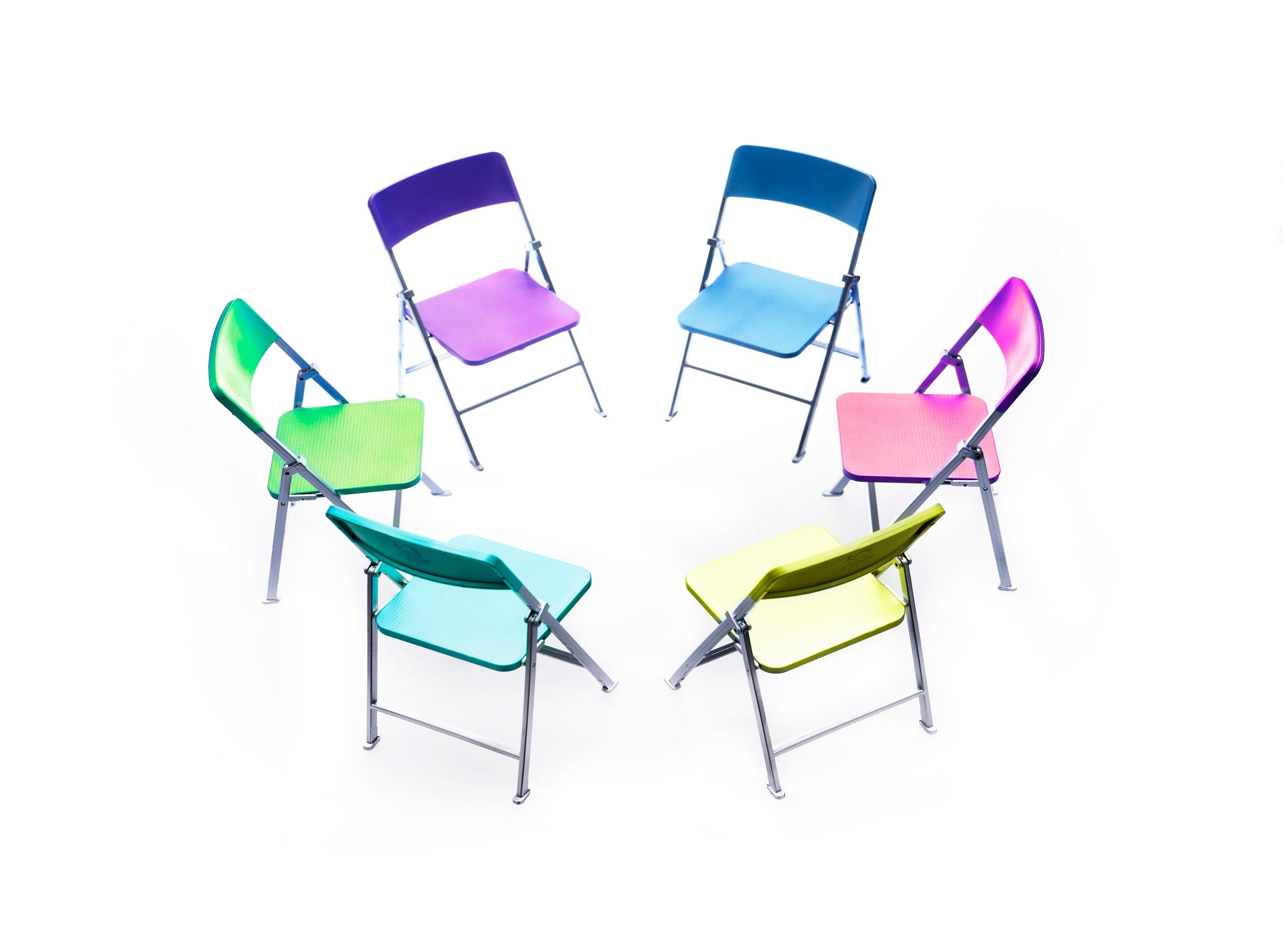 Circle of chairs of different colours