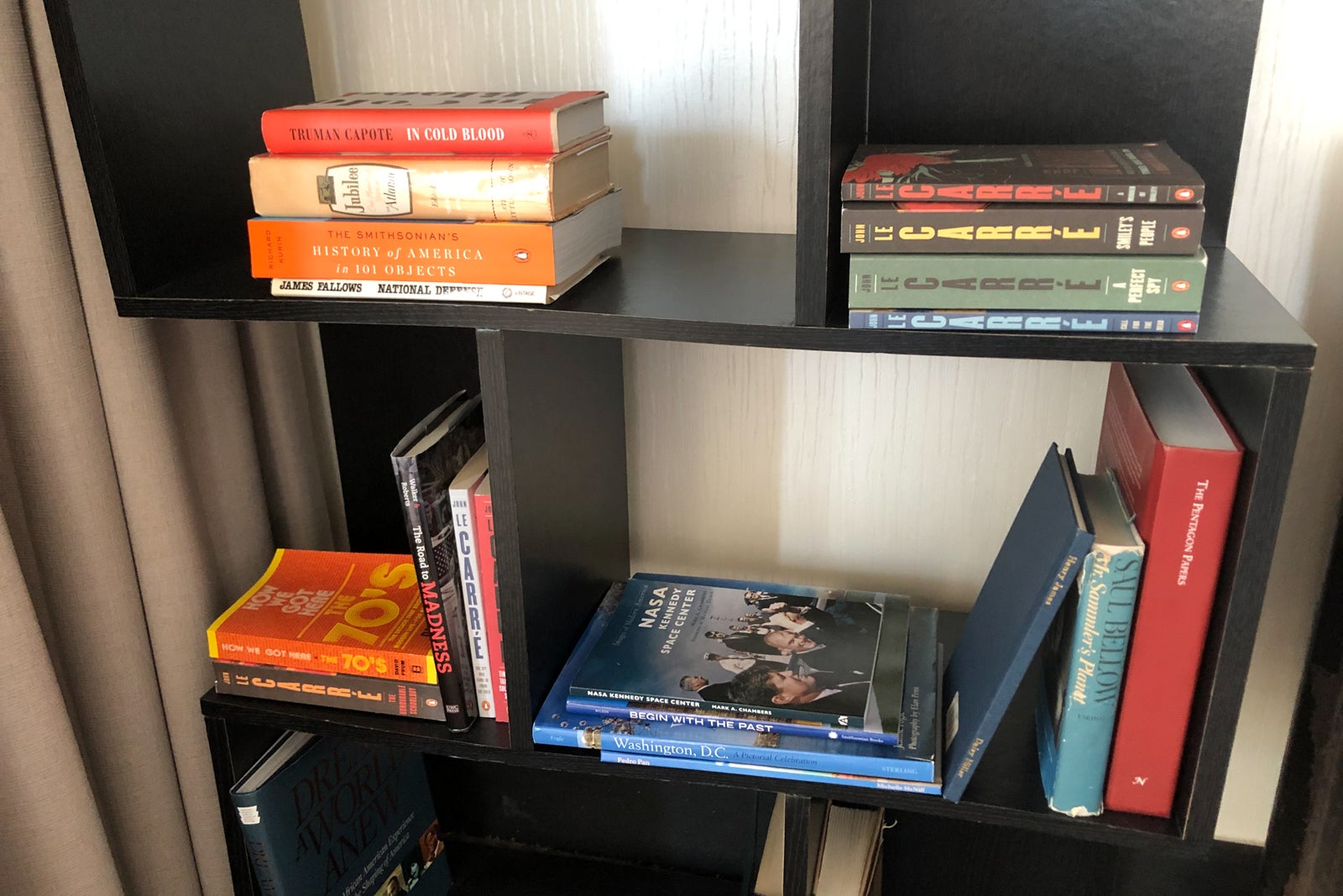 The Scandal Room's bookshelf houses a number of appropriate books, including spy novels and a copy of the Pentagon Papers.