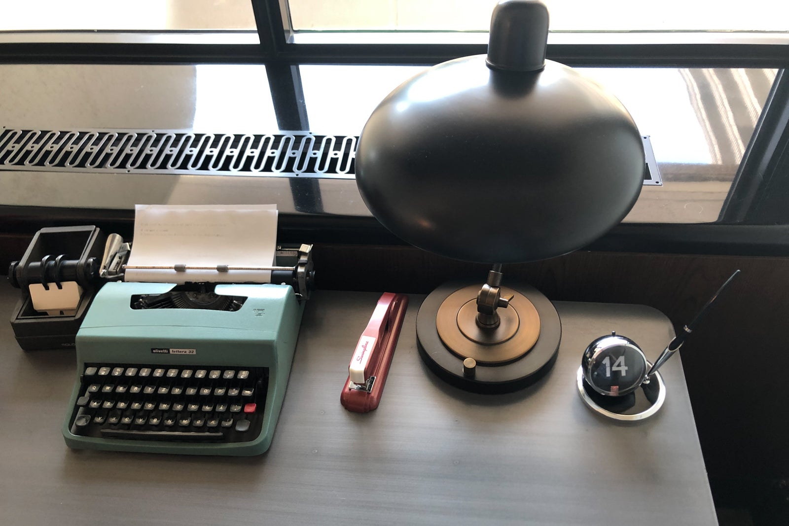 On top of the Scandal Room's antique desk, you'll spot a Rolodex, a period-appropriate lamp, a red stapler and an old-school typewriter.