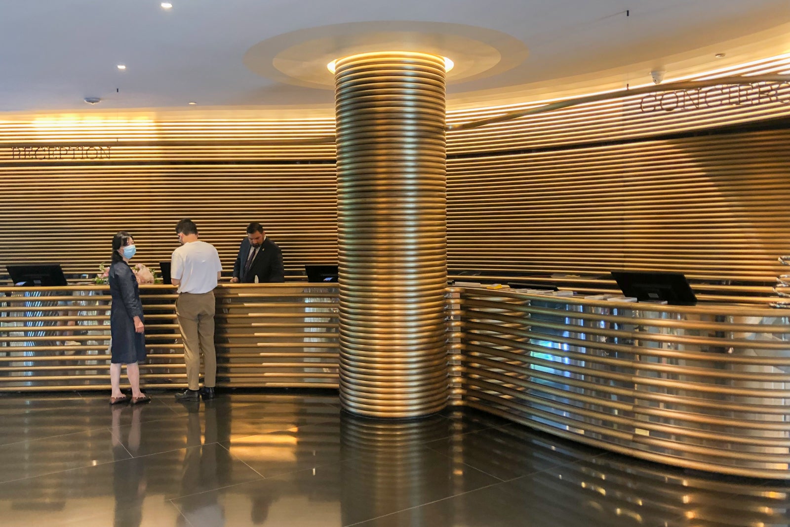 A long, curved brass desk awaits you when you check in to The Watergate Hotel.