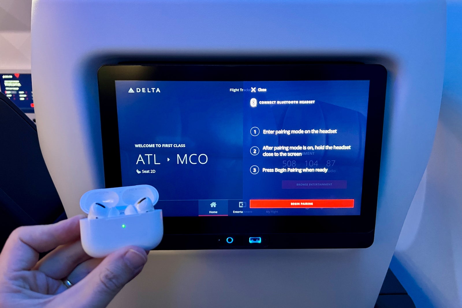 This Bluetooth Transmitter Lets You Watch In-Flight Entertainment With  AirPods