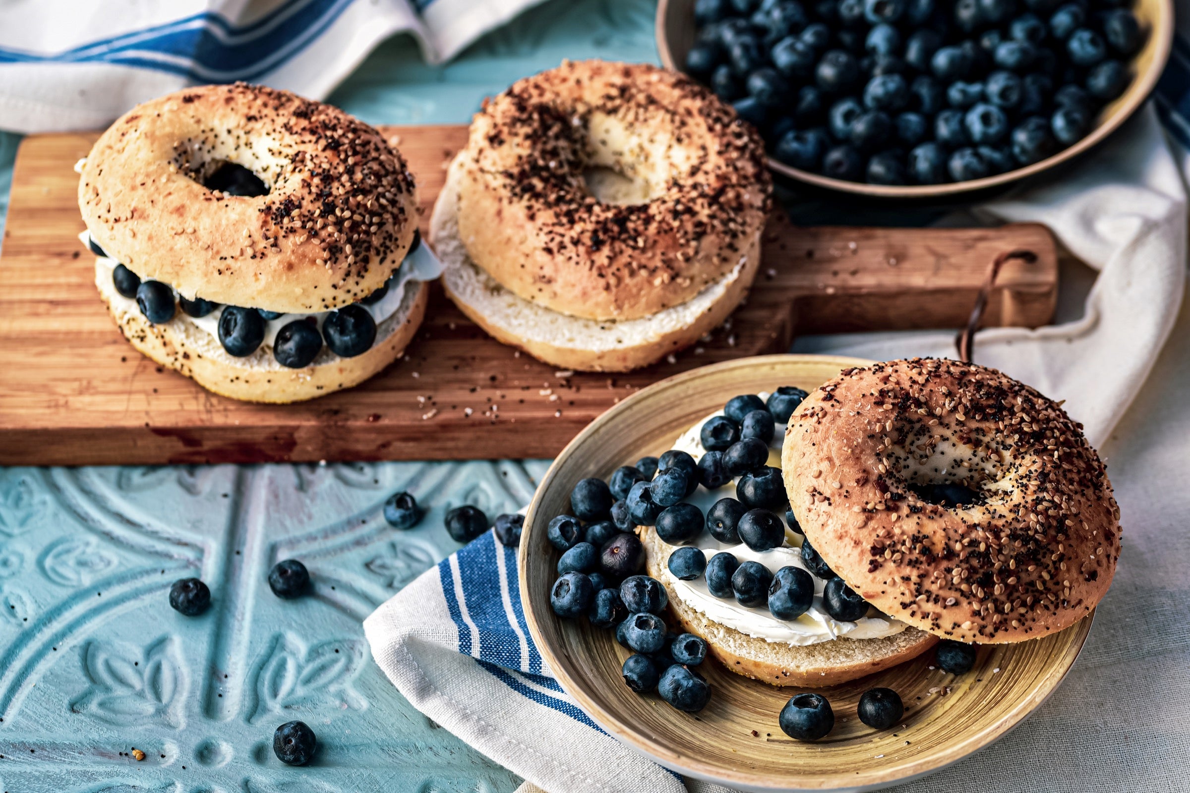 Bagels with cream cheese and blueberries