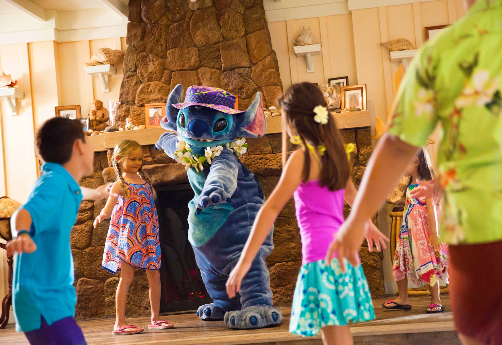 Kids playing with Stitch at Aulani, a Disney Resort & Spa