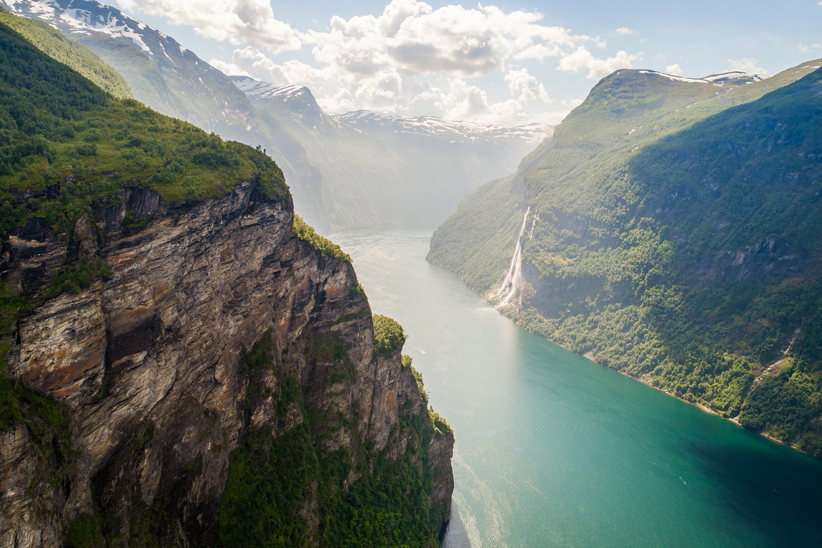 An aerial shot of the majestic, UNESCO-protected, Geirangerfjord in the Møre og Romsdal region of Norway. Taken on a bright summer afternoon.