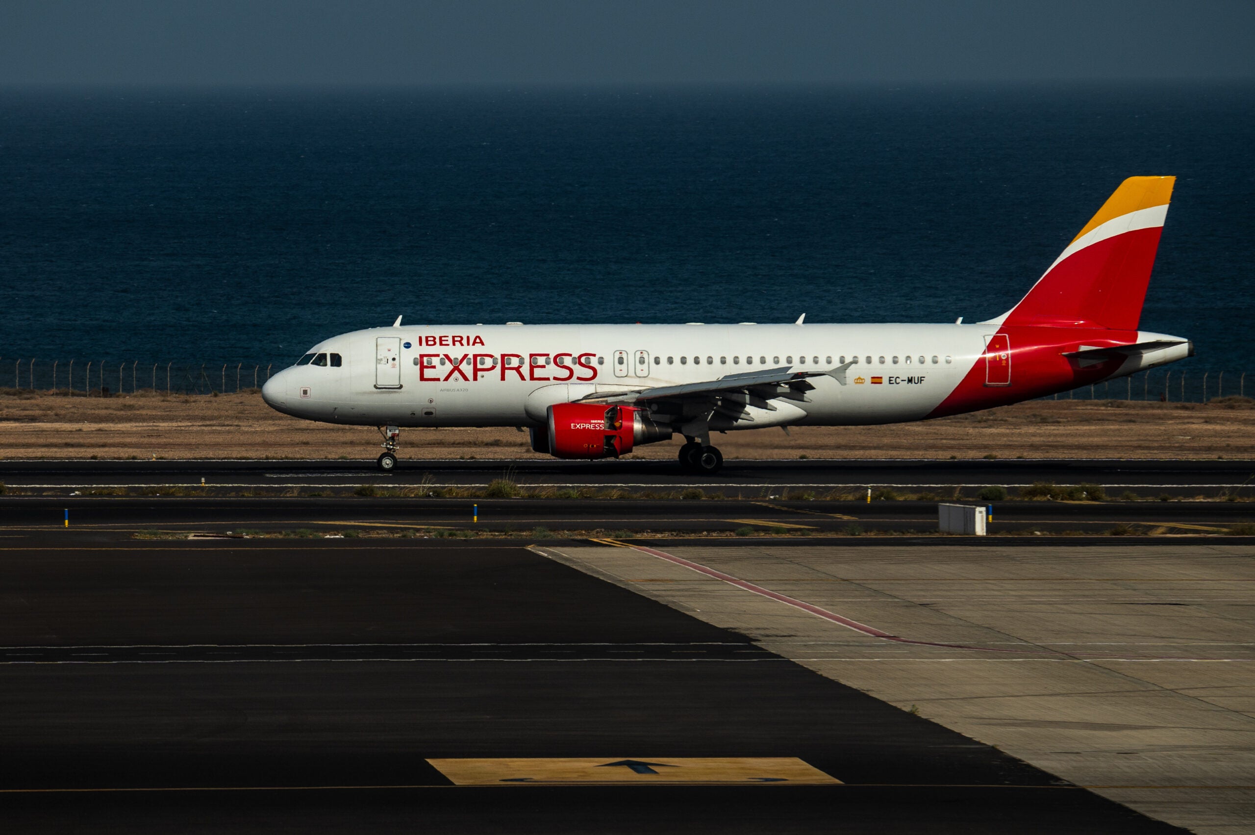 Iberia Express airplane lands in the Cesar Manrique Airport