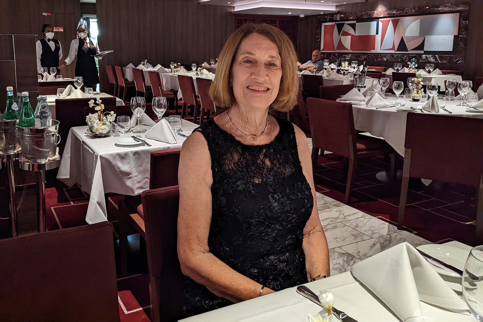Elegantly dressed woman in cruise ship dining room