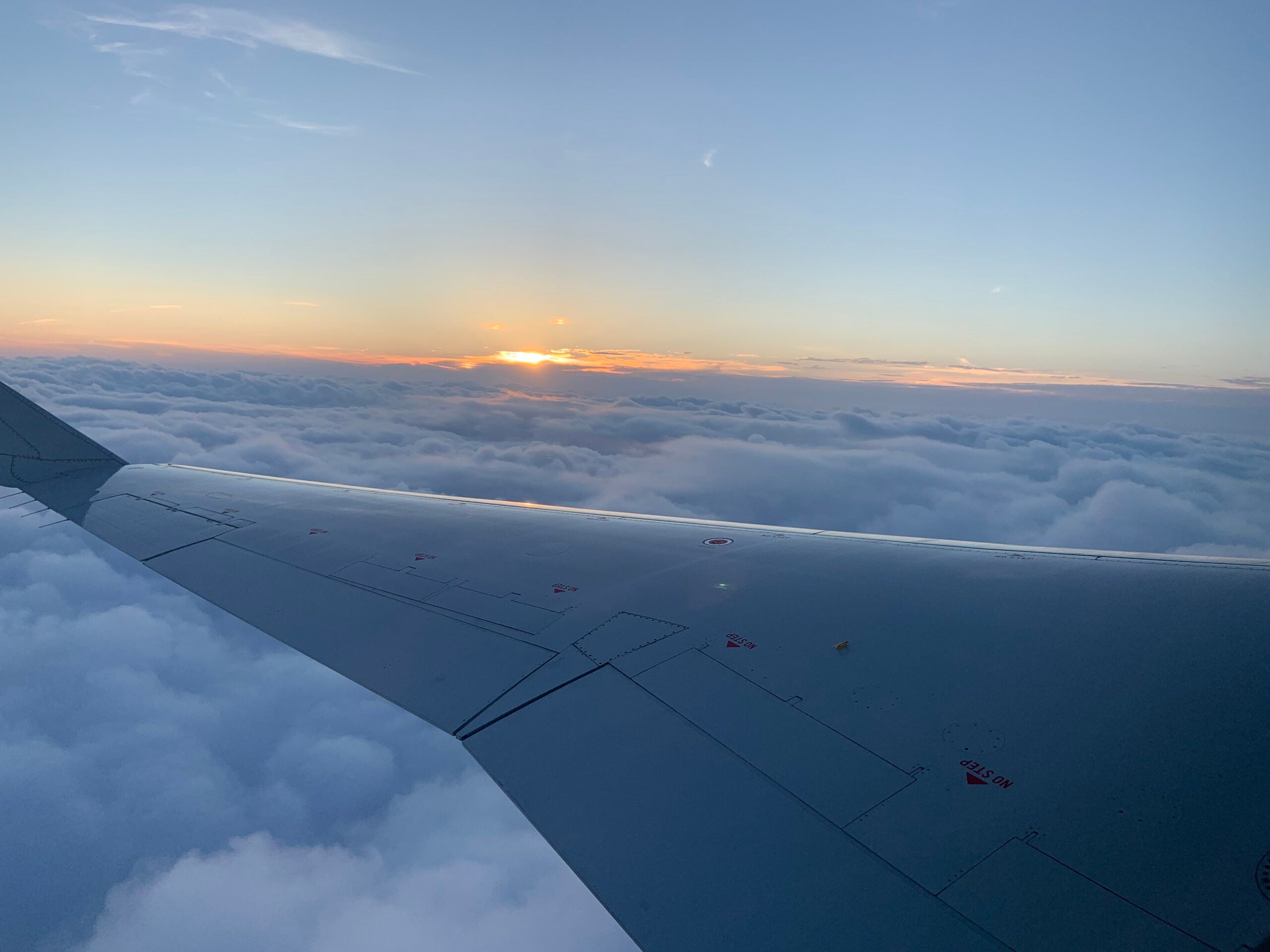 plane clouds photo