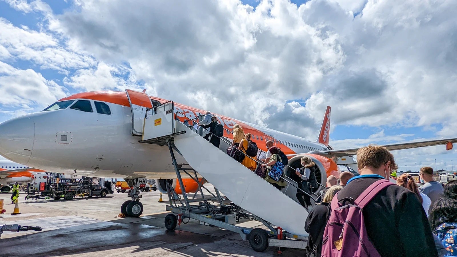 passengers boarding plane