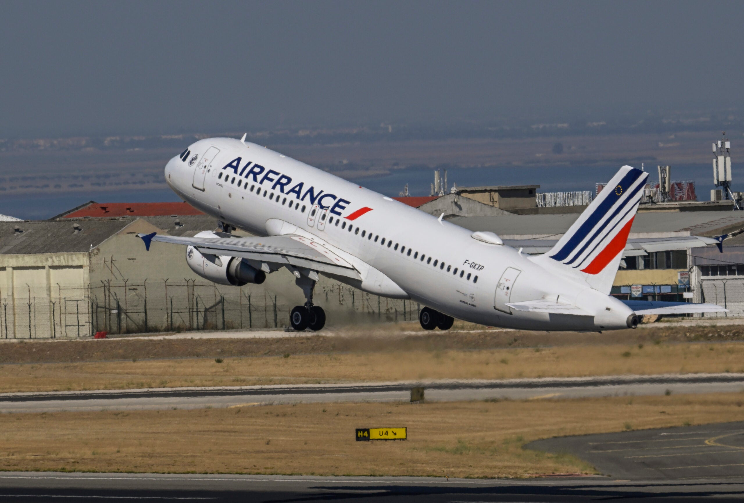 An Air France plane is taking off from Lisbon Airport