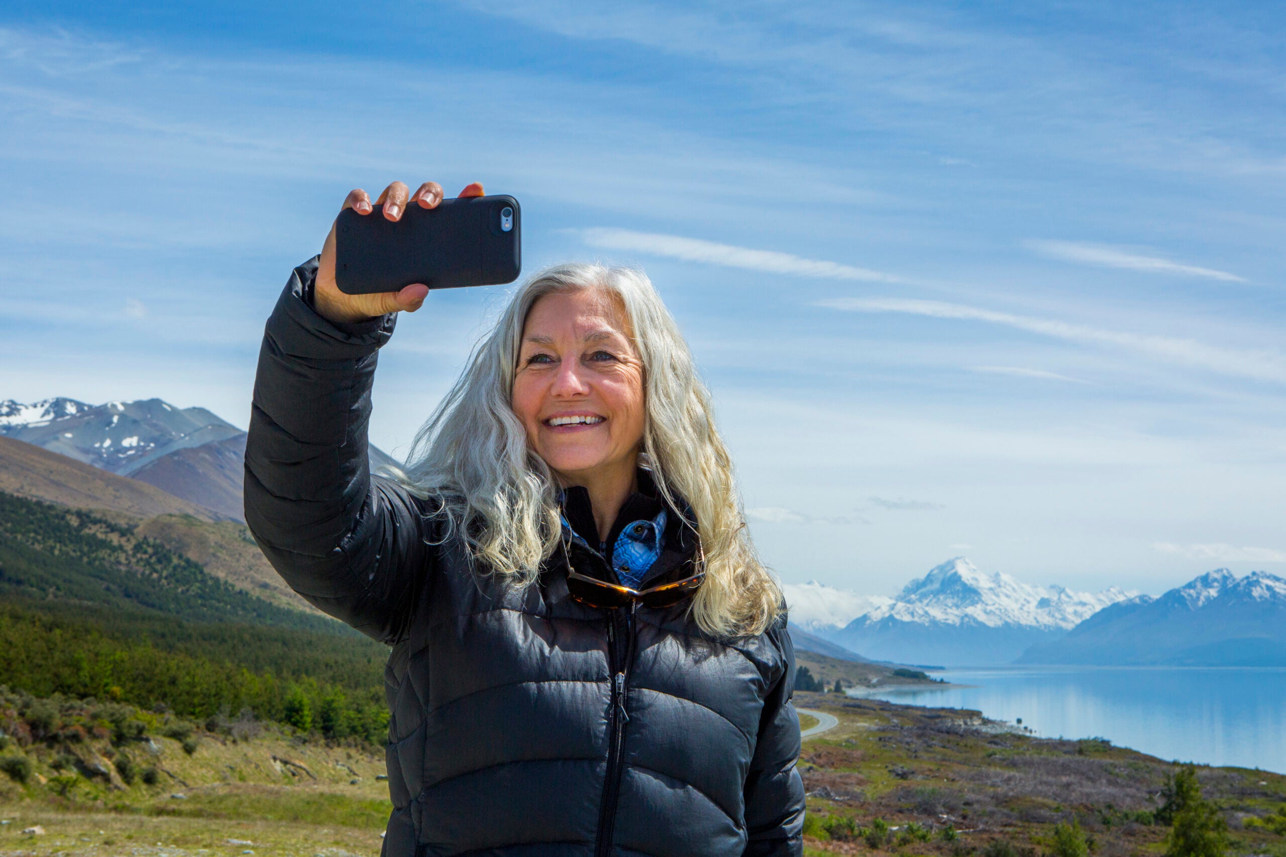 woman takes selfie during a hike