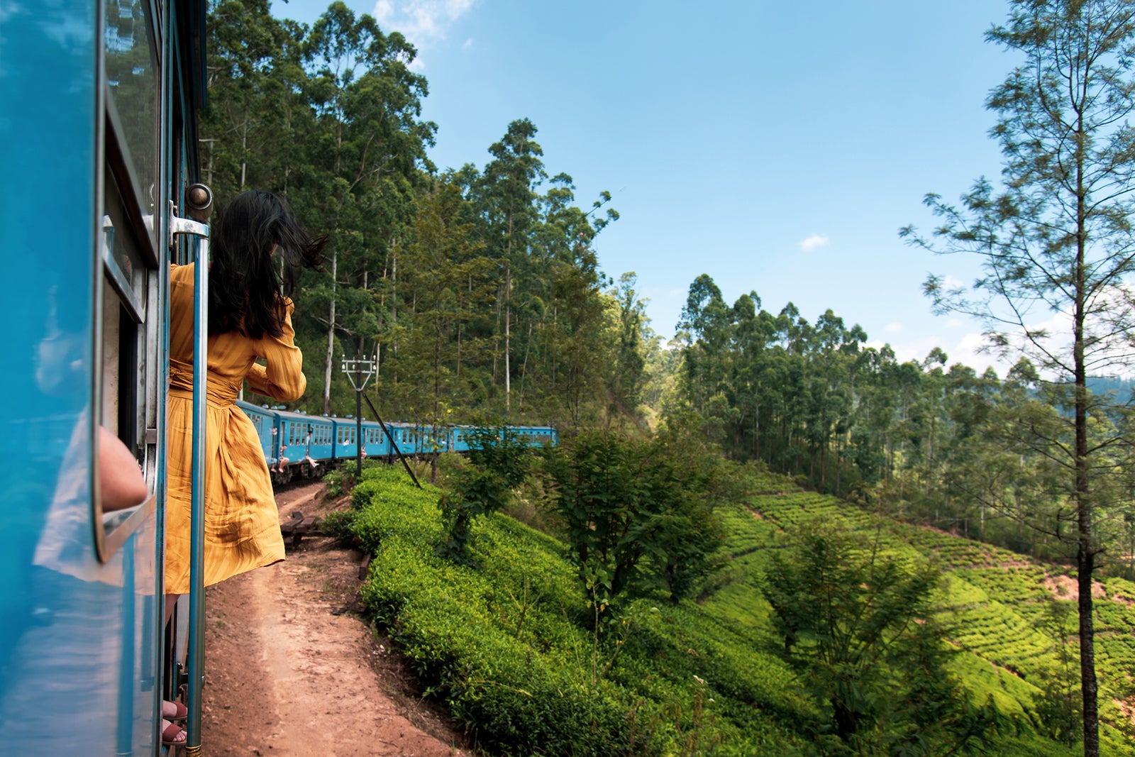 Woman taking the train ride in Sri Lanka tea plantations