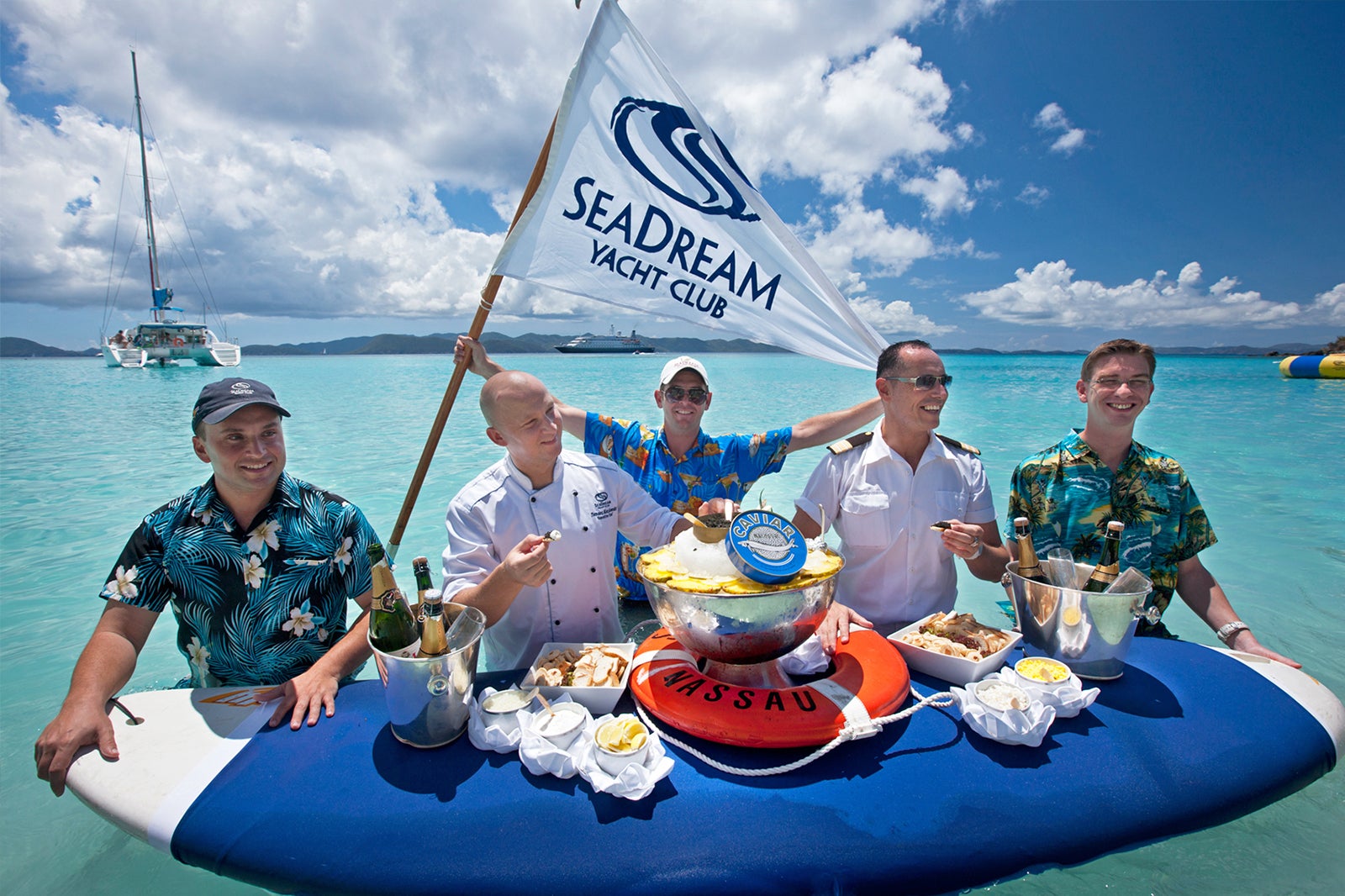 Caviar served on a surfboard with SeaDream Yacht Club