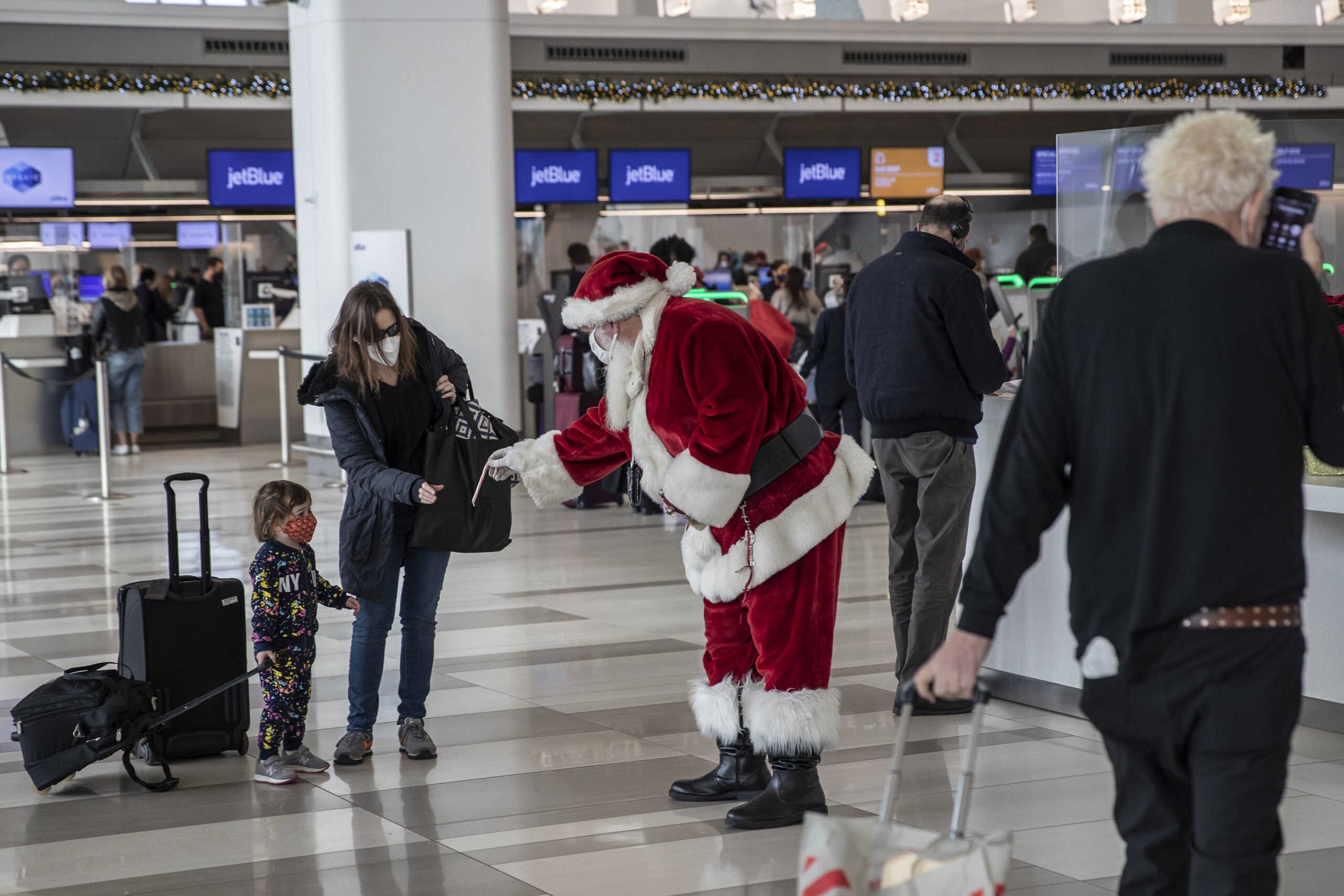 Santa greets passengers at airport