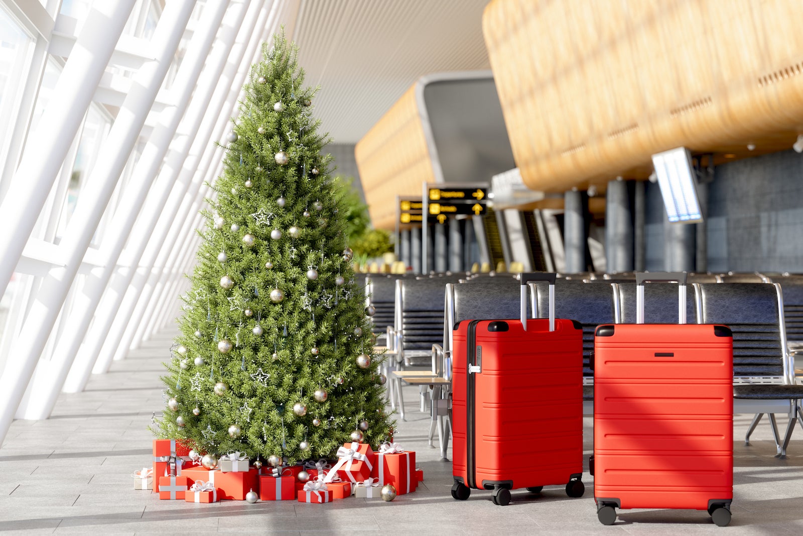 suitcases next to christmas tree