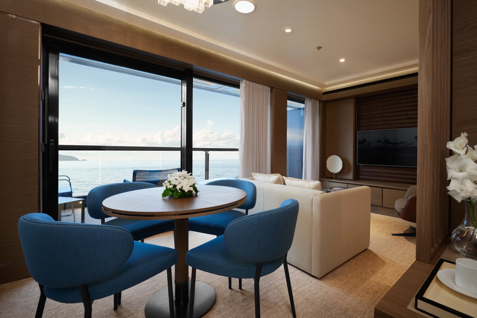 Dining area of the Signature Suite aboard Evrima, The Ritz-Carlton Yacht Collection