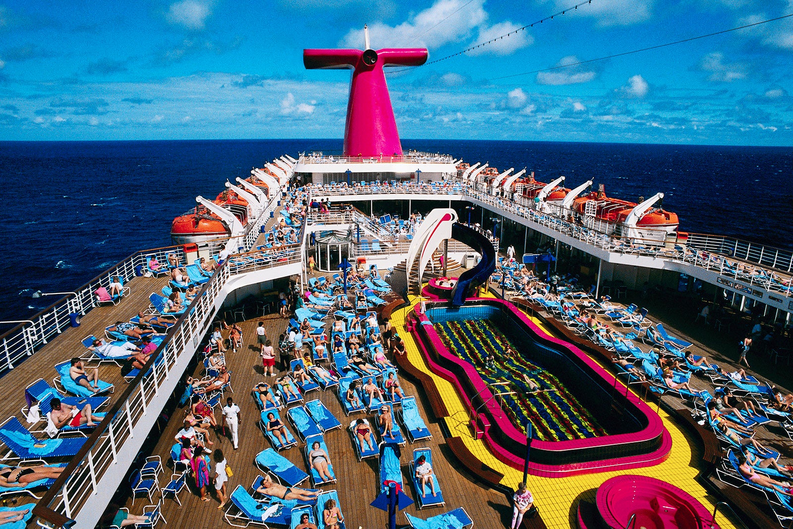 Crowded sun deck on cruise ship near the Bahamas