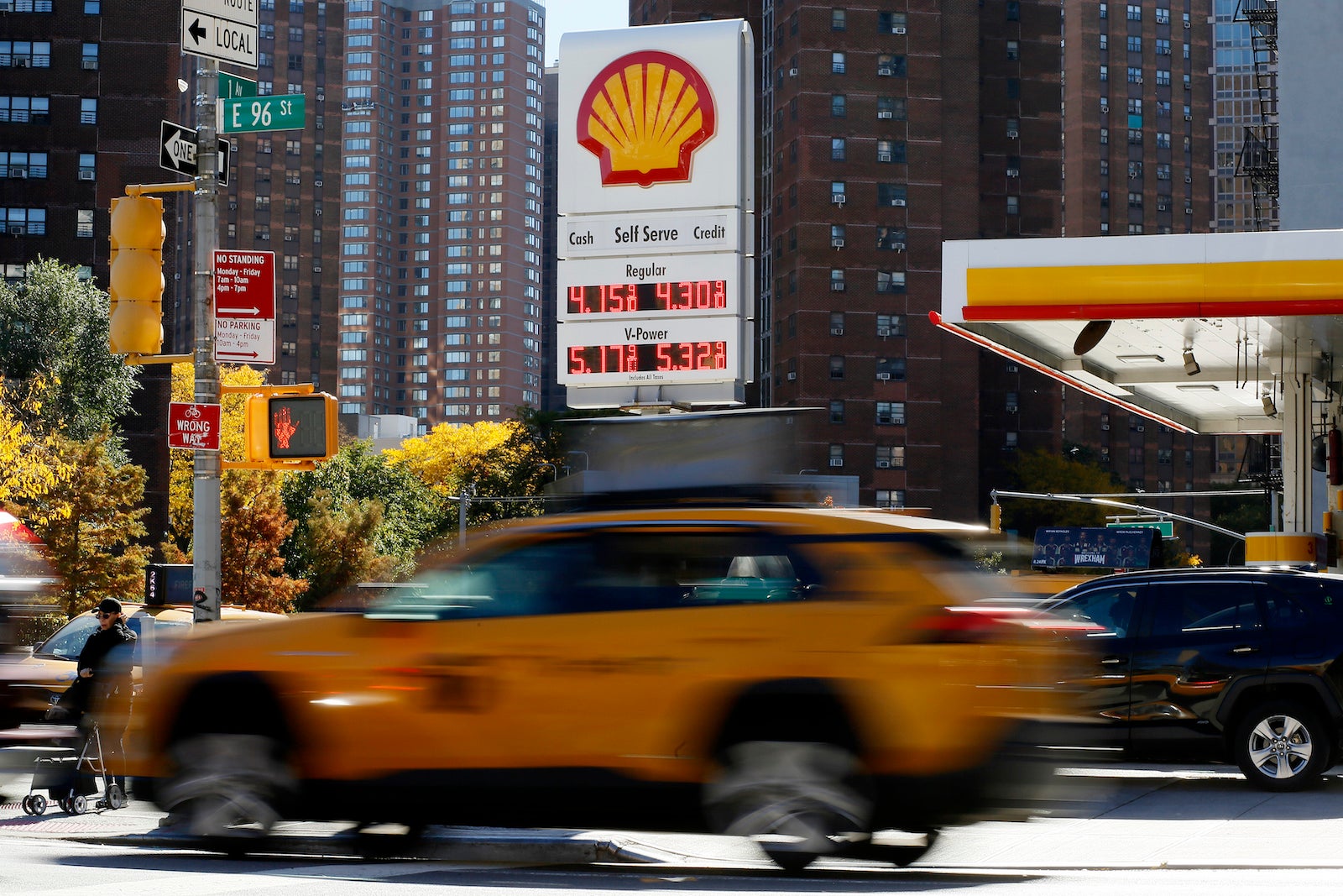 A taxi passes by a Shell gas station in New York City