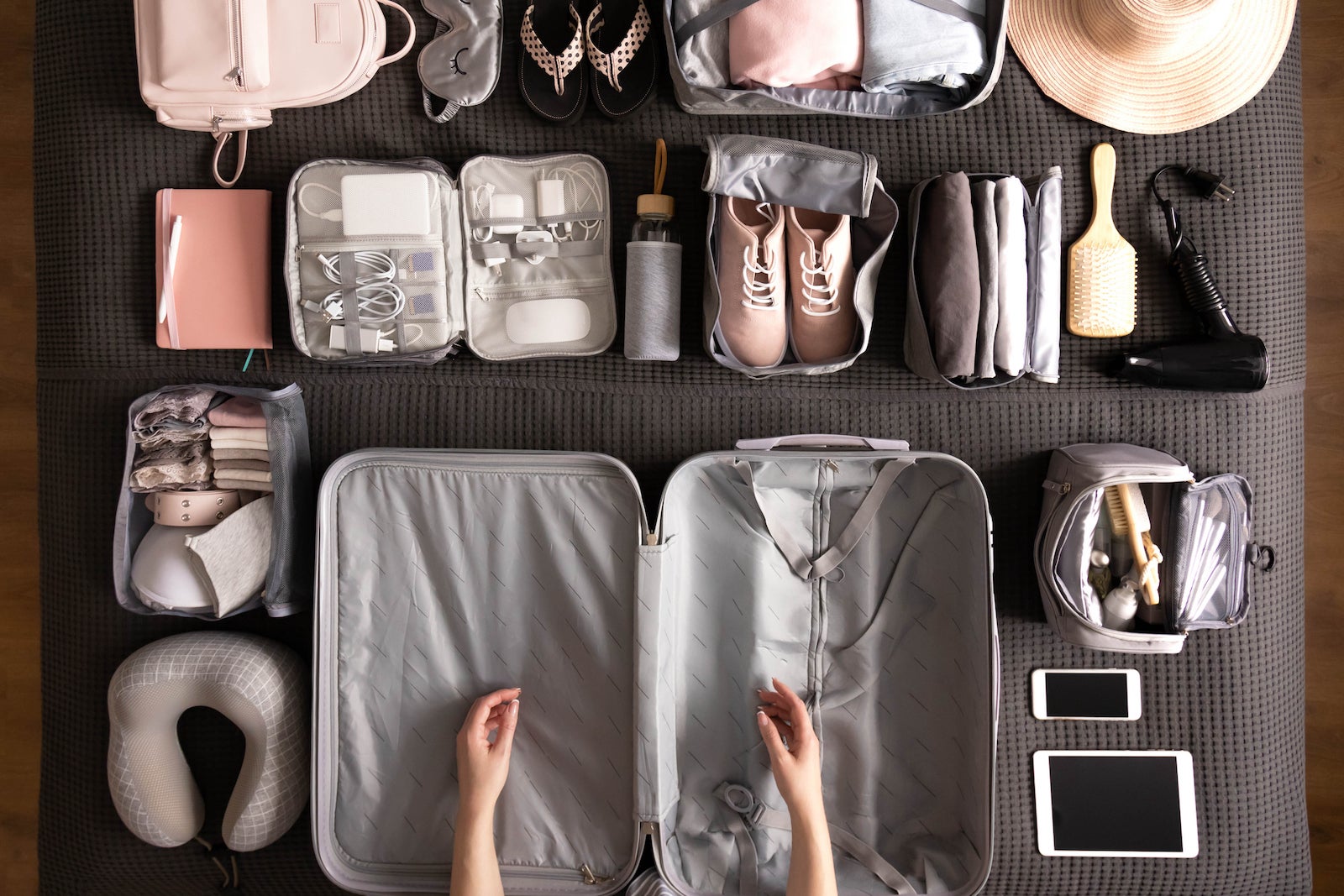 Travel Packing Above And Hands Of A Woman With Clothes Holiday Luggage And  Prepare For International Summer Suitcase Ready And Person Traveling With A  Suitcase Vacation Clothing And Hotel Bag Stock Photo 